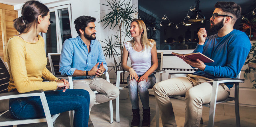 small group sitting in chairs for therapy