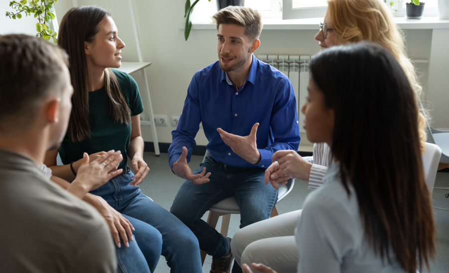 small group sitting in a circle